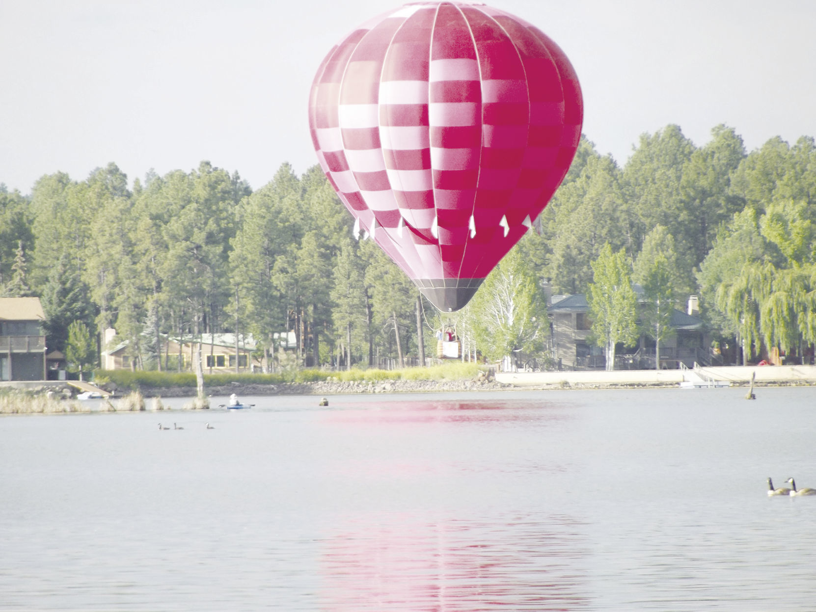 Red balloon above Rainbow Lake